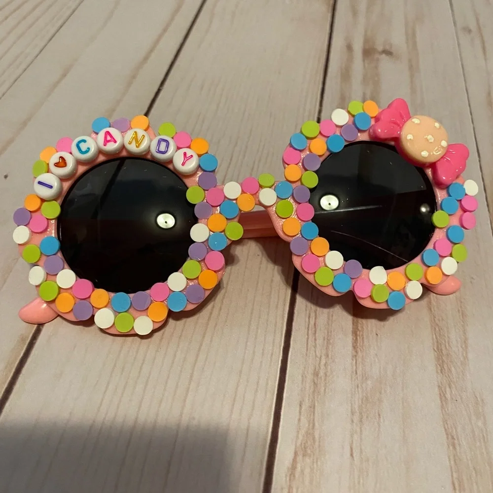 Girls pink flower shaped sunglasses w candy